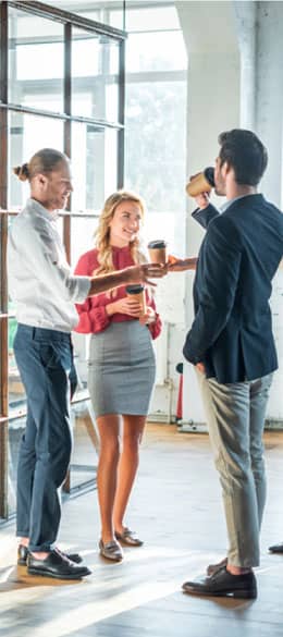 img - business-colleagues-having-conversation-hall-coffee-break