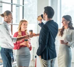 work colleagues talking over coffee