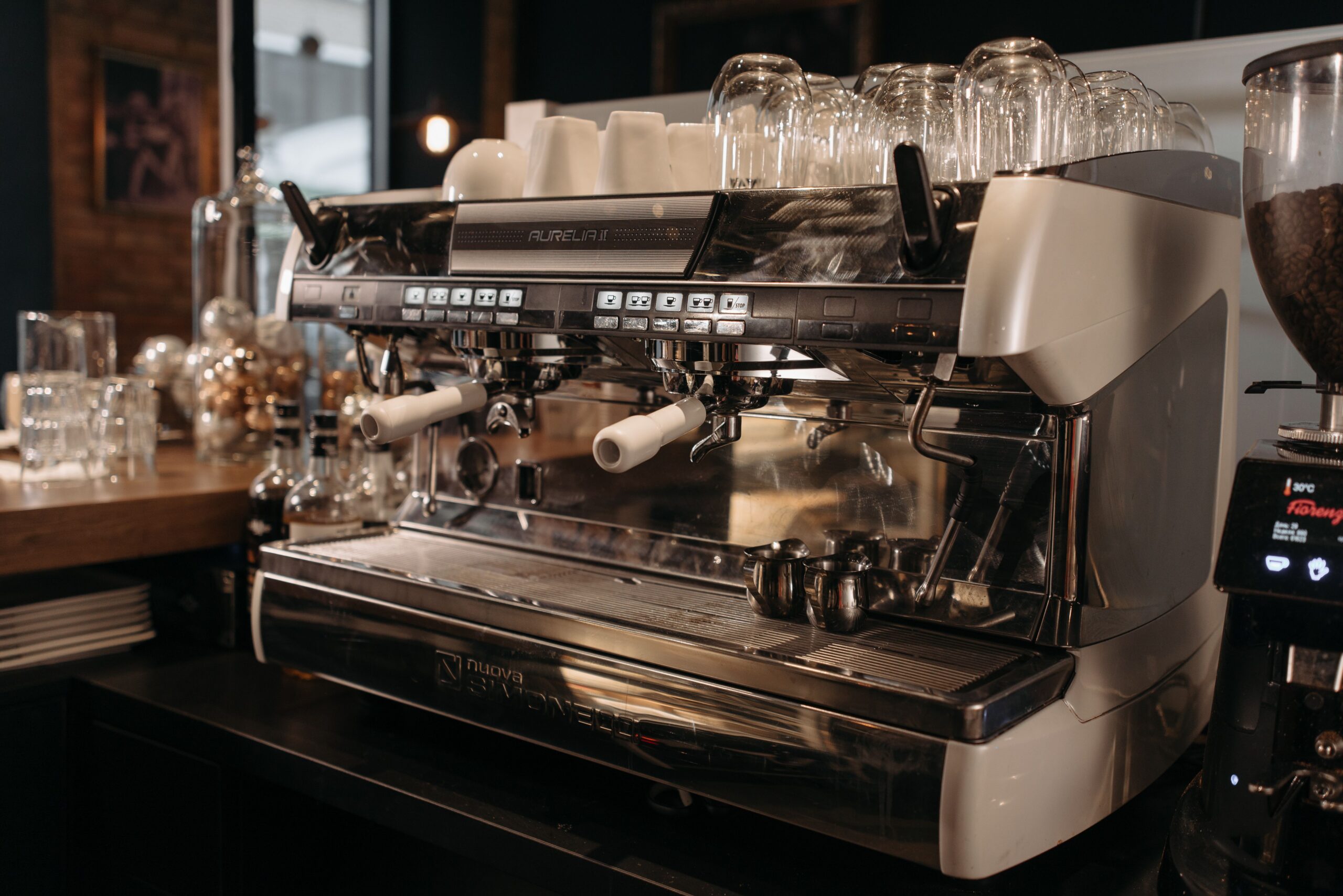 Commercial coffee machine in a foodservice setting requiring routine troubleshooting and maintenance.